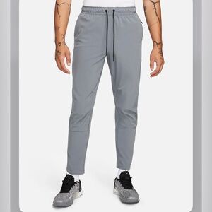 NWT Nike Unlimited men's dri-fit tapered leg pants.